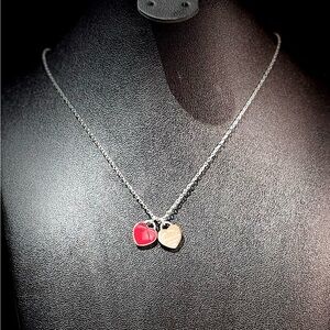 Elegant Silver and Red Heart Pendant Necklace